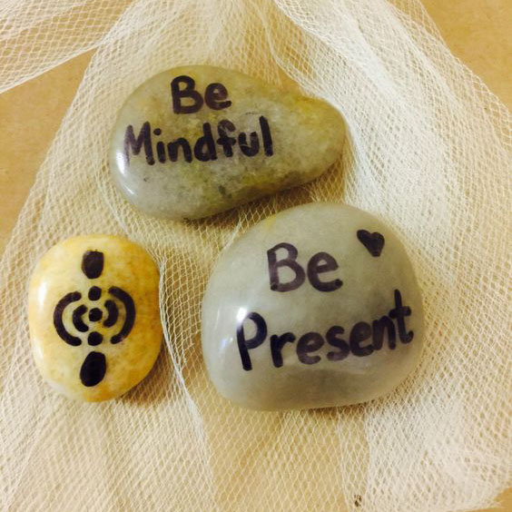 Mindfulness reminder - Stones with Mindfulness symbol - Be mindful, be present text