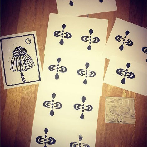 Linocut interpretations of the mindfulness symbol