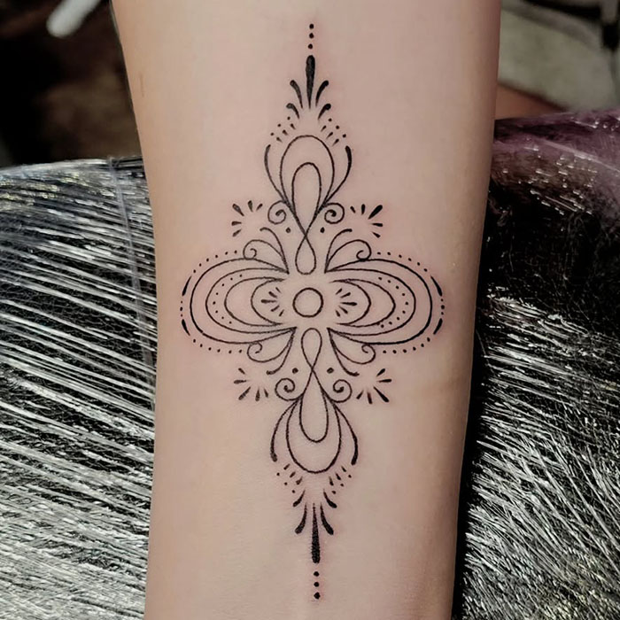 Stylized mindfulness tattoo interpretation