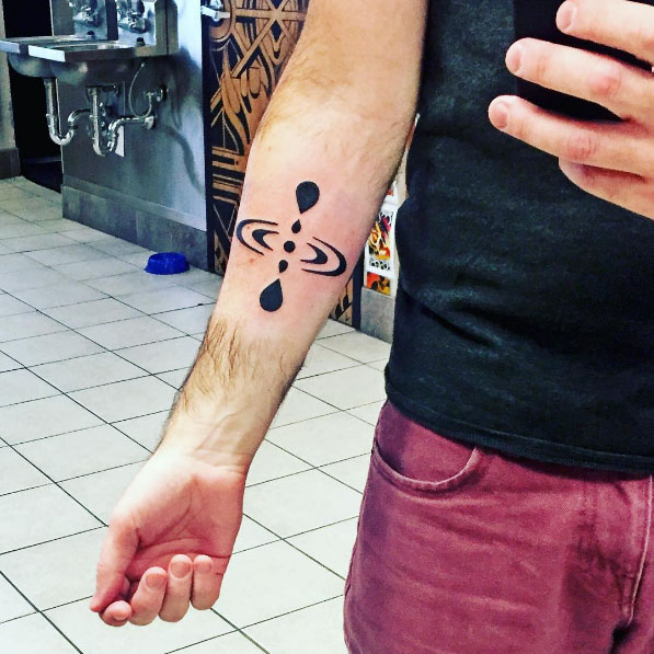 Mindfulness tattoo on a hand