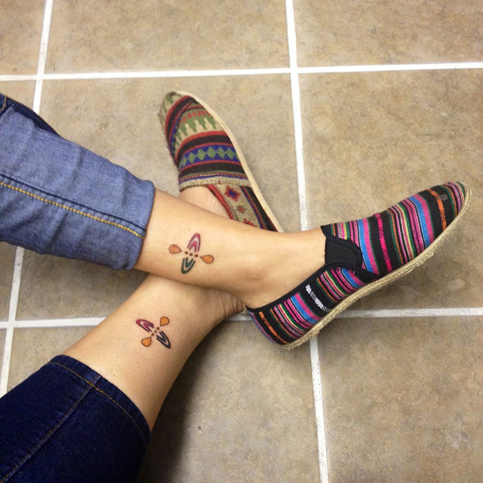 Mindfulness tattoo on legs